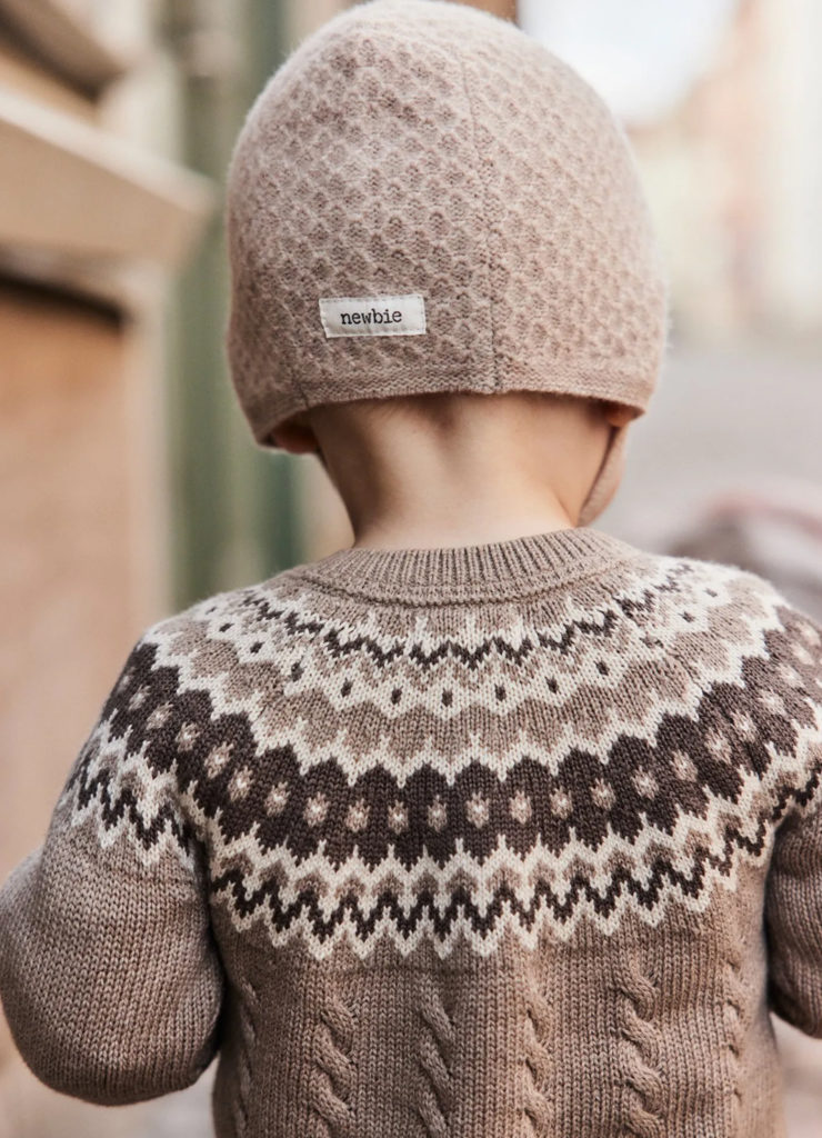 Liten lue i merionull til baby